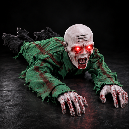 Crawling Zombie Bald Halloween prop on a dark studio background